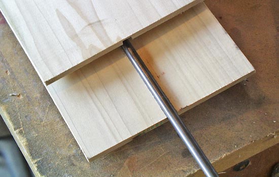  For the blade, I glued together two sheets 1/4″ Poplar with a channel cut to contain a 5/16″ steel rod. 