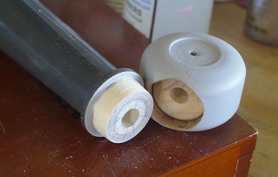  For the pommel, I lathed a yoyo shape from basswood and then drilled out the base. 