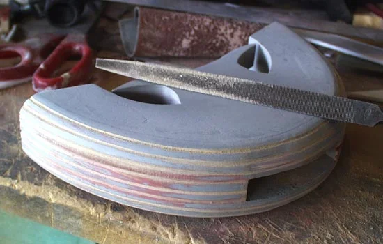 I used a series of files to carve grooves into the curve of the guard.