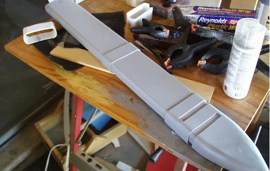 I glued the cap and center band (also heat formed plastic like collar) and gave it all a pretty coat of primer.