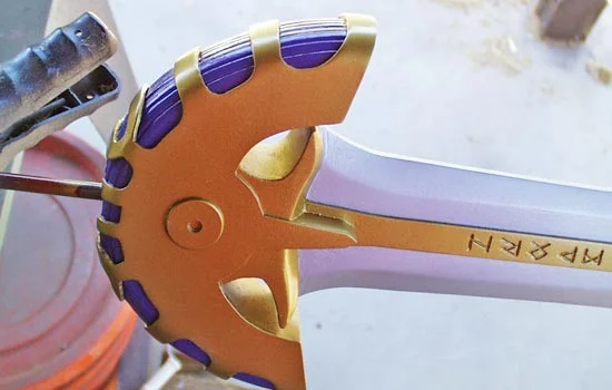 I painted the blade and top coated it with Future to protect the finish.