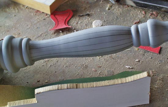  I made a template of the curve on the bottom hand grip and drew lines for the fluting. 