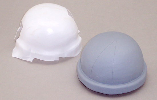 After the dome was formed, I used it to (badly) vacuum form plastic over it. The plastic was cut up to make the dome plates.