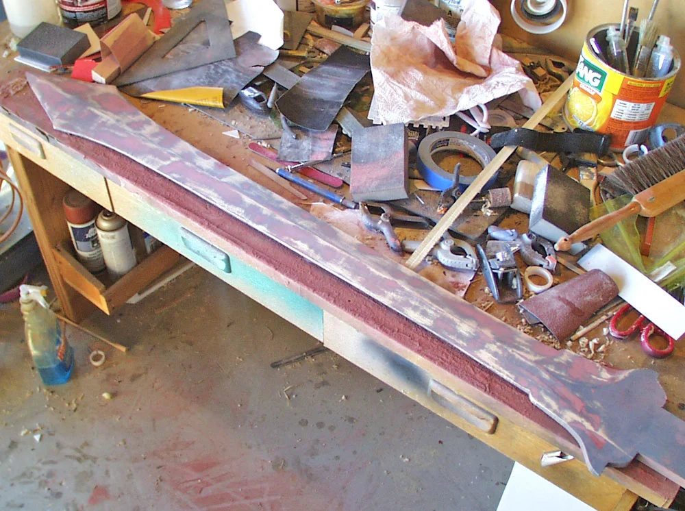 Much putty, primer and sanding later, I have a smooth blade.