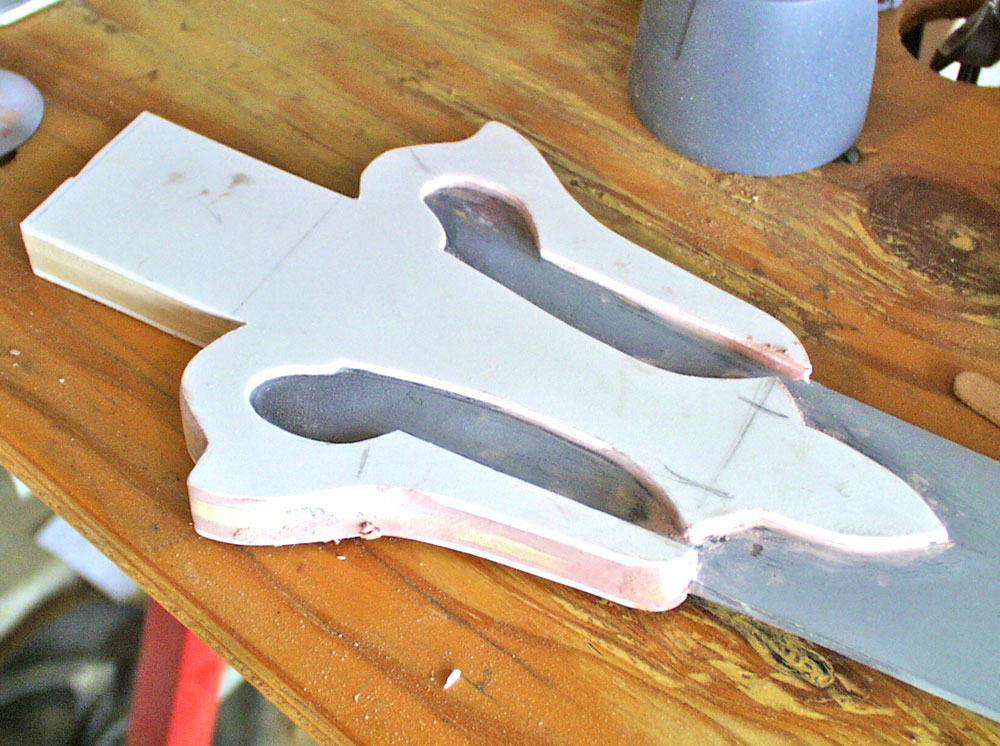  I formed the detail at the top of the blade with thick styrene. 