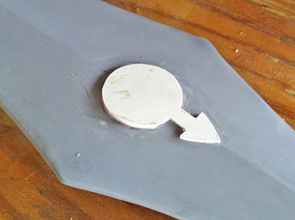  The flat gem detail at the blade tip was made with styrene and I filled the bevel gap filled with Bondo. 