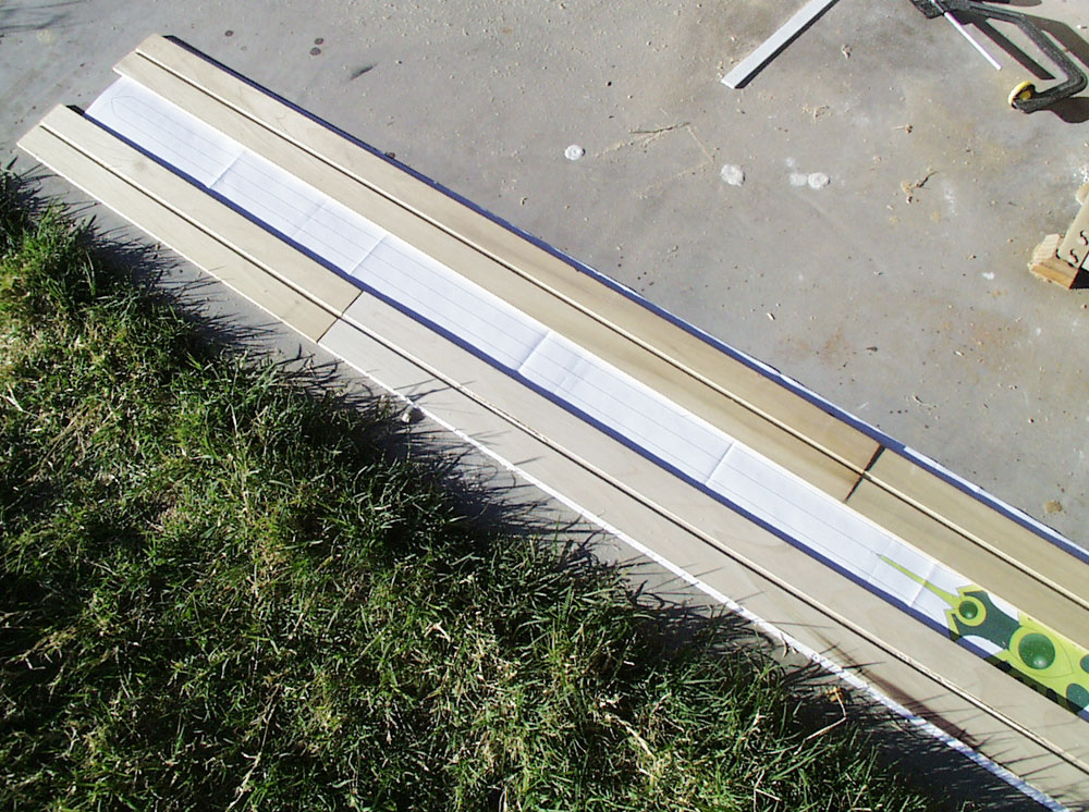 The poplar wood that I use for swords only comes in 4 ft lengths. To make up the extra length, I offset laminated the wood.