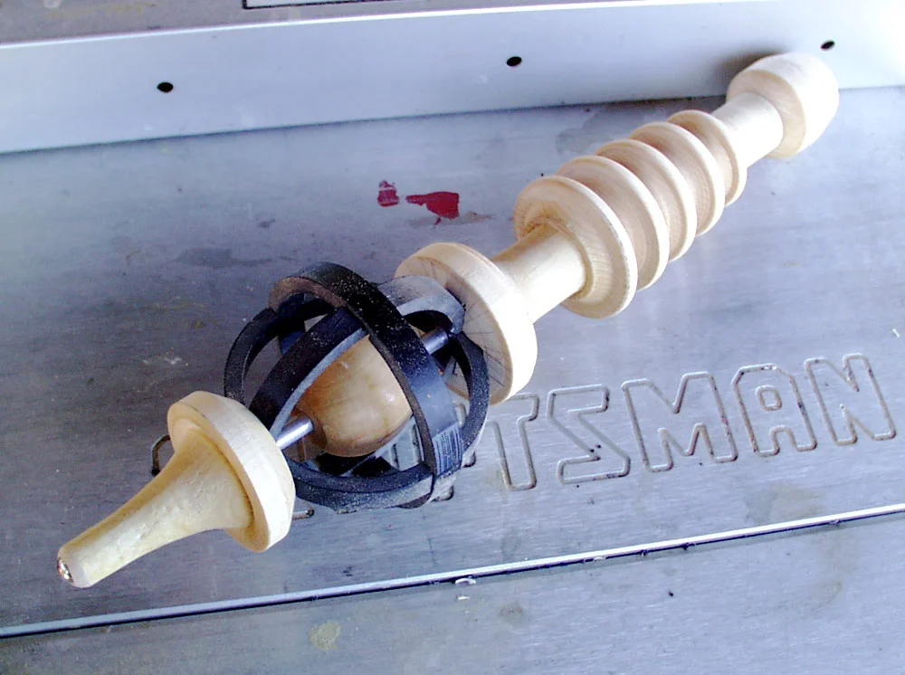 The base parts glued together. I added a steel screw in the end to protect the wood.