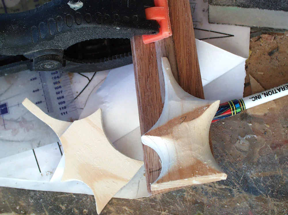 The blade base was shaped from blocks of pine and glued to each side.