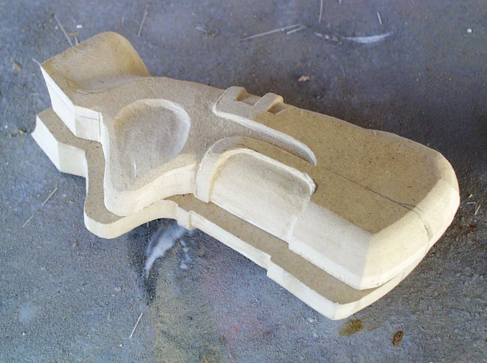 I carved the recessed areas to the grip.