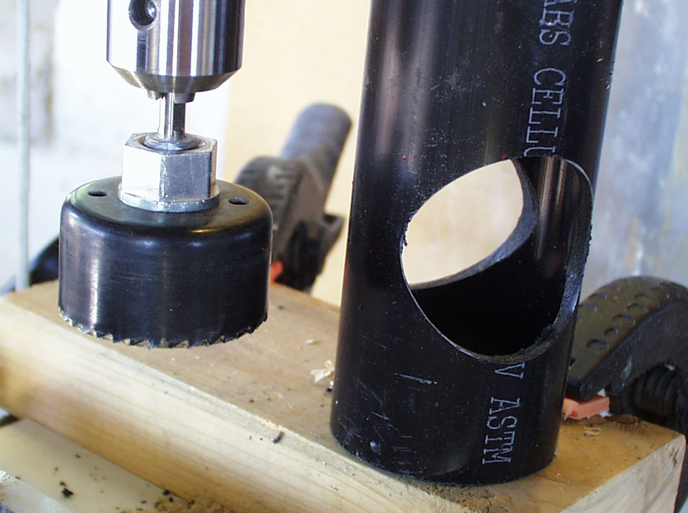 I used a PVC pipe for the receiver and drilled a hole for the pivot arm section.