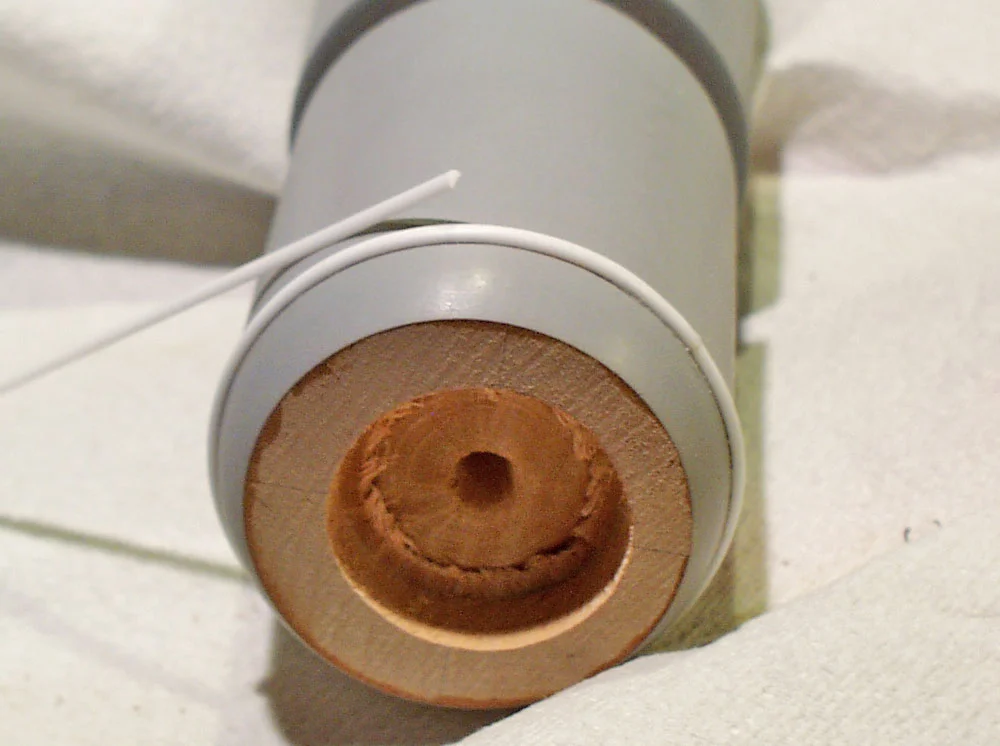 I glued on half-round styrene piping to the gun. The tight curves were heated first.