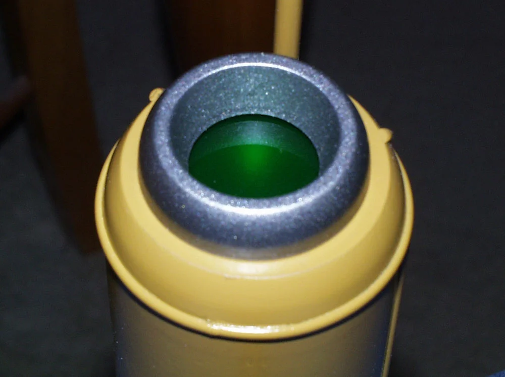 The muzzle ring is glued on over the acrylic.