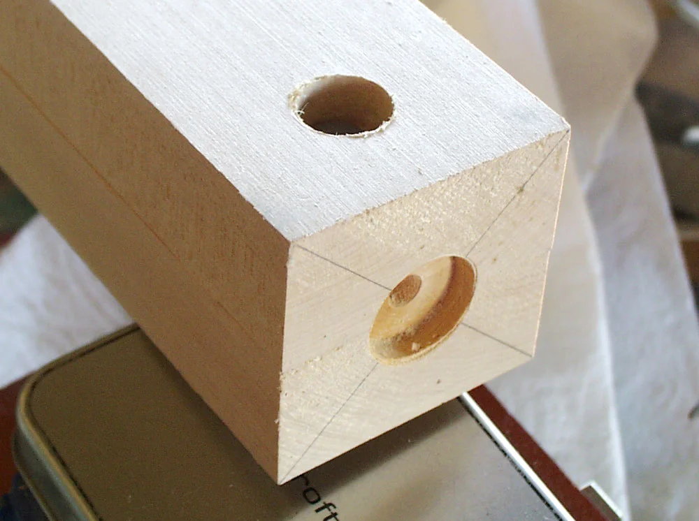 I started to build the Caster barrel by bolting two pieces of bass wood together for lathing. Since the barrel will be molded, I needed to be able to separate it in two halves.