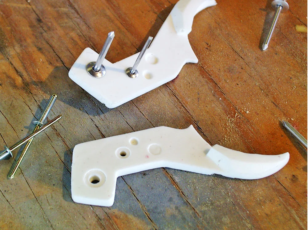 Holes drilled and test fitting of rivets for the trigger guard.
