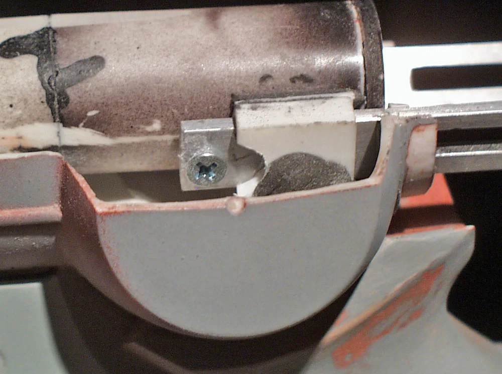 I used a screw to stop the rail from moving out too far. The rails needed a slot cut out of the center.