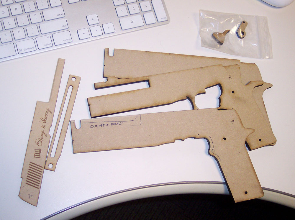  I planned out the guns so they could be built using layers of laser-cut MDF. This would allow for maximum accuracy as well as the engraving on the barrels. 
