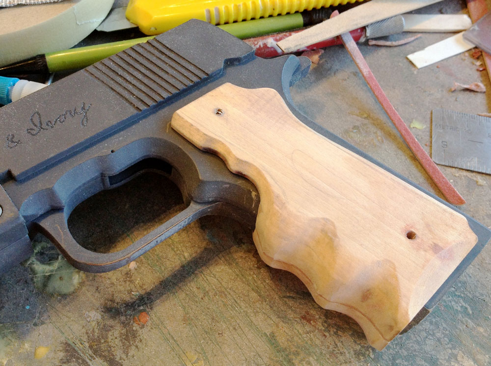  Some work with the Dremel sander and the front of the grip takes shape. 