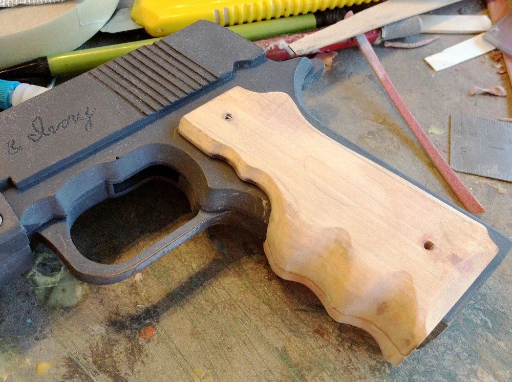 Some work with the Dremel sander and the front of the grip takes shape.