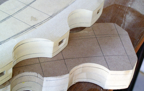 I started to shape the bumps on the belt sander, rounding the outer edges.