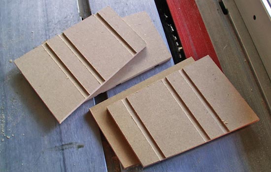  The magazine sides were made from 1/4" MDF. I cut decorative slots in the sides with the table saw. 