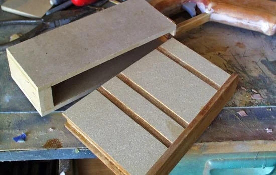 MDF forms the box that holds the magazine.