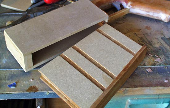  MDF forms the box that holds the magazine. 
