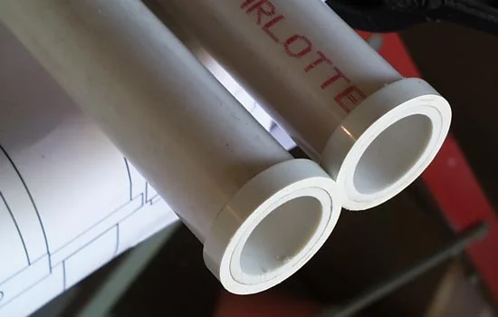 The body of the rifle is a 35" long piece of 1-1/2" PVC pipe. The rings at the rear sling loop and bipod were formed by cutting sections from a PVC connector.