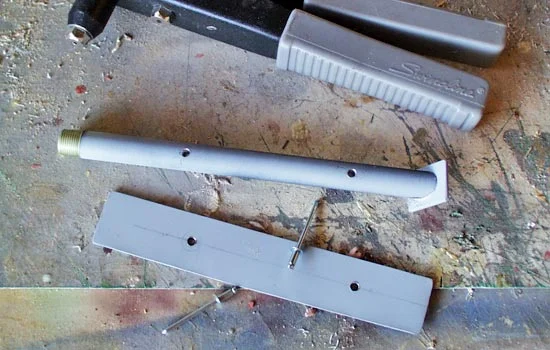 I cut panels from sheet aluminum and attached them with pop rivets to the legs.
