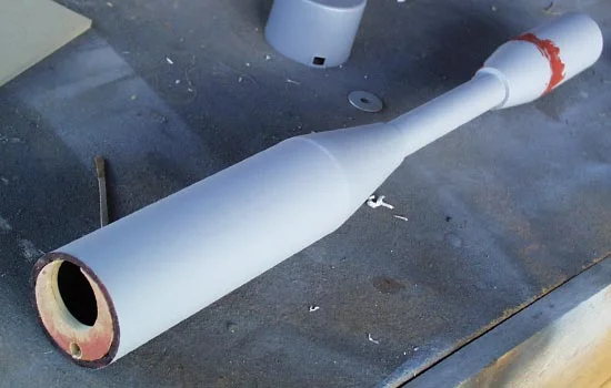 The scope was made from PVC (front and rear sections), wooden dowel, lathed wooden cones and MDF end caps.