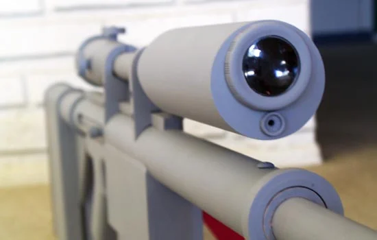 Detail of the scope. I forgot to add the lens on the small range finder.