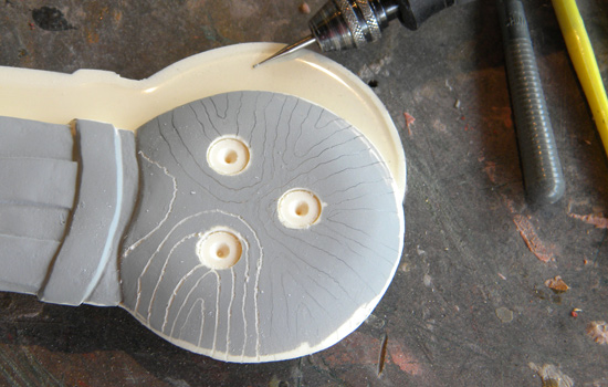 I also carved the wood grain into the pommel rather than just painting it on.