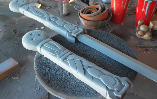  A fresh coat of primer on both hilts in preparation for final painting. 