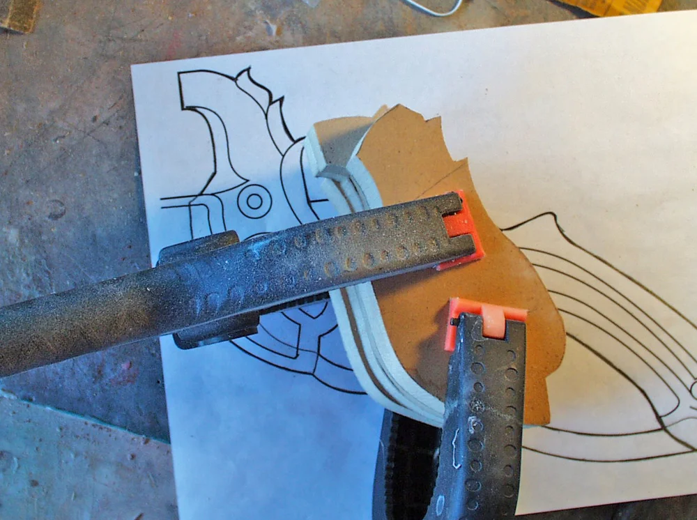The basket guard was made from four 1/2″ MDF sections. Each side’s parts were laminated together and then each half was lightly glued for shaping.