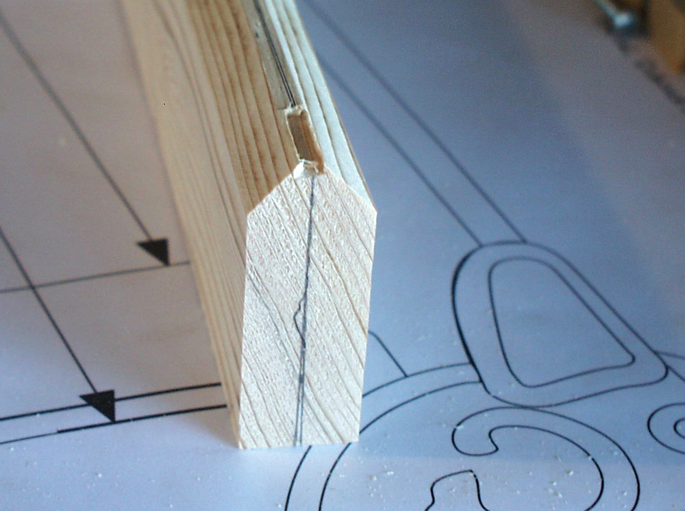  After the board was cut to width, I cut the two 45º bevels on top and then Dremeled out a slot for the front sight. 