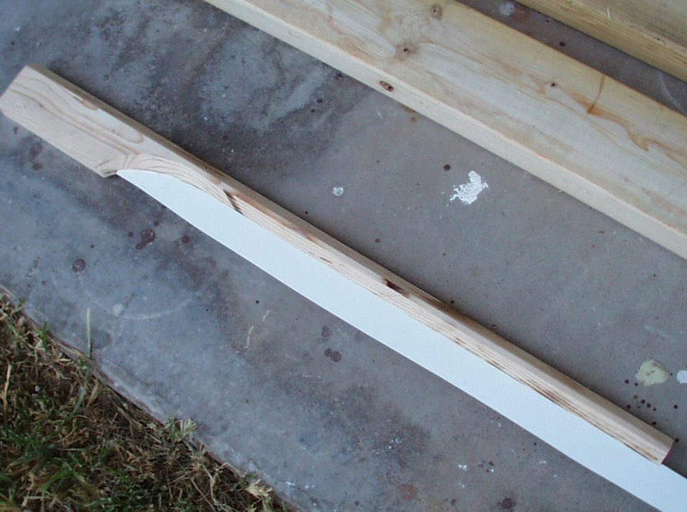  The bottom 45º of the barrel were cut on the table saw (at great risk) leaving the last 5 inches to manually shape. Inserted is the .060 plastic for the blade that perfectly fits the kerf of my table saw! 