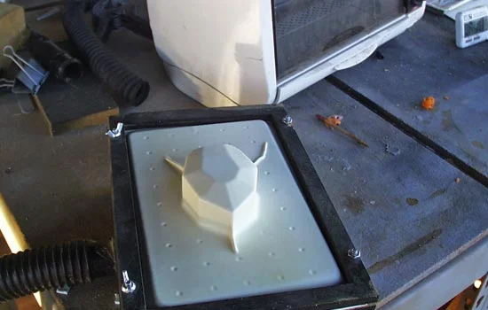 I used my mini-vacformer to shape .09 plastic around each half.