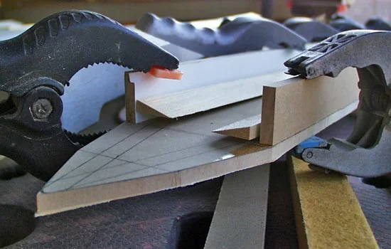 I used the scrap pieces from cutting the blade angle to make the inside fit better.