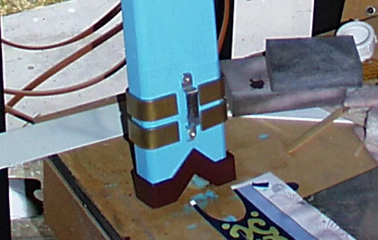 Here is is in place on the back of the scabbard.