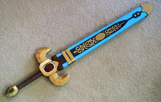  Here is the final scabbard. The blue and gold details were cut out of thin plastic. 