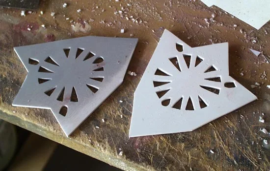 The scabbard end cap was made from thick styrene with holes cut into it.