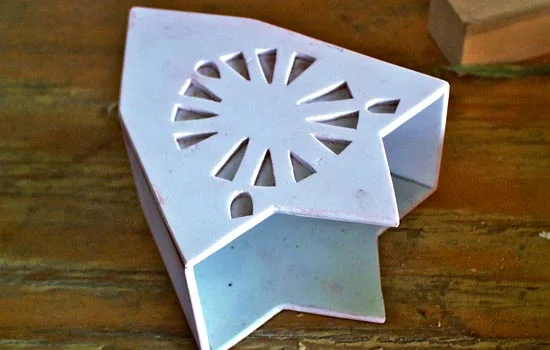 Sides were added to make a box. The holes were backed with a very thin styrene.