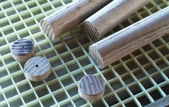 The end cap was cut off the dowel to allow it to fit around the blade.
