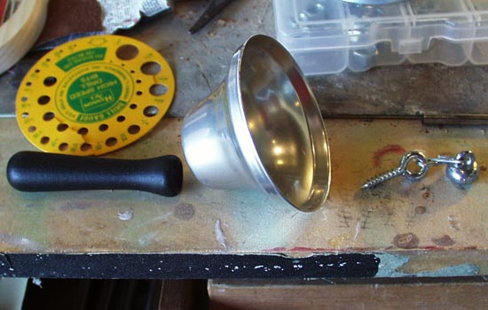 I ordered a bell from a medical supply company and disassembled it.