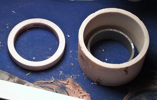  To fabricate the ring around the star at the pommel, I inserted one PVC pipe inside another and cast resin between them. 