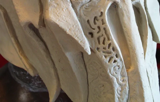 I stamped the texture to the helmet and scribed in some of the runes around the nose holes.