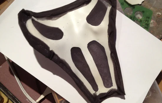 I stretched black nylons over the styrene and hot glued them to the back of the plate.