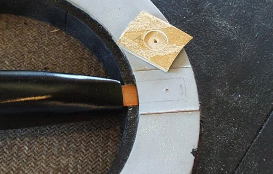 The ring sections were glued back into place and then puttied.