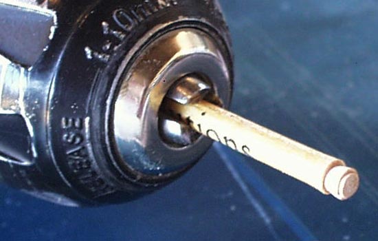  The lock was “lathed” out of a golf tee with a power drill and a file. 