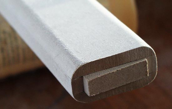 The end was plugged with a small piece of MDF and then rounded with a router.